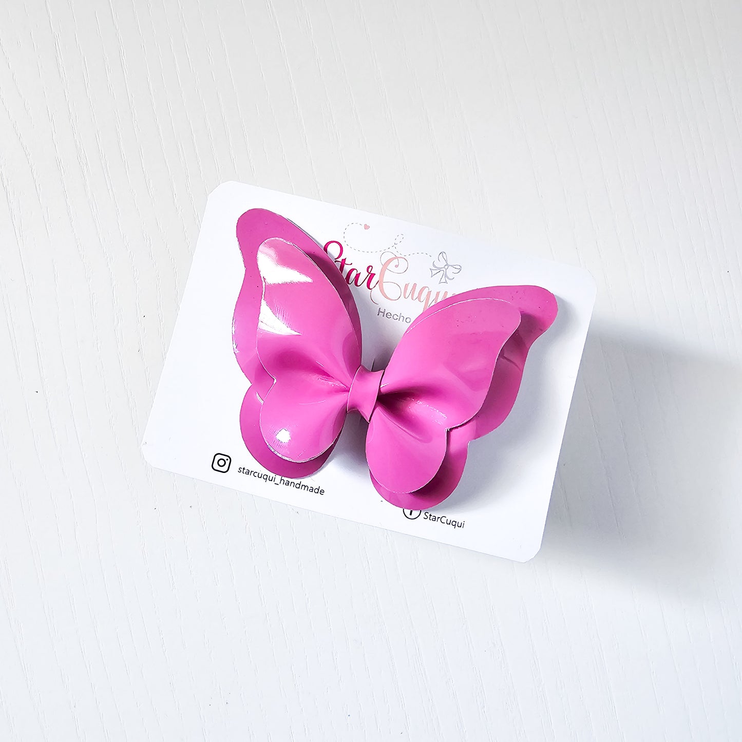 Mariposa charol rosa