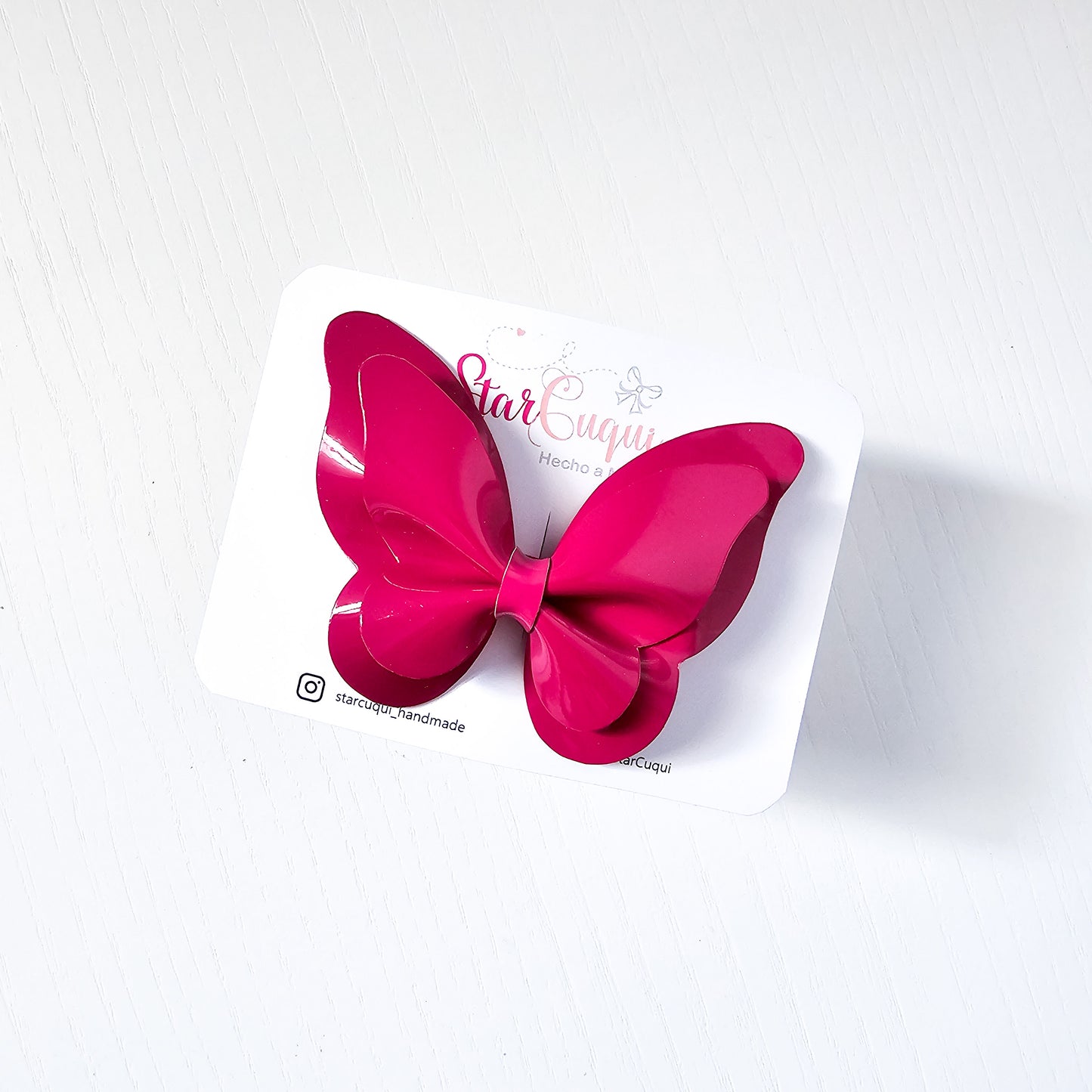 Mariposa charol fuscia