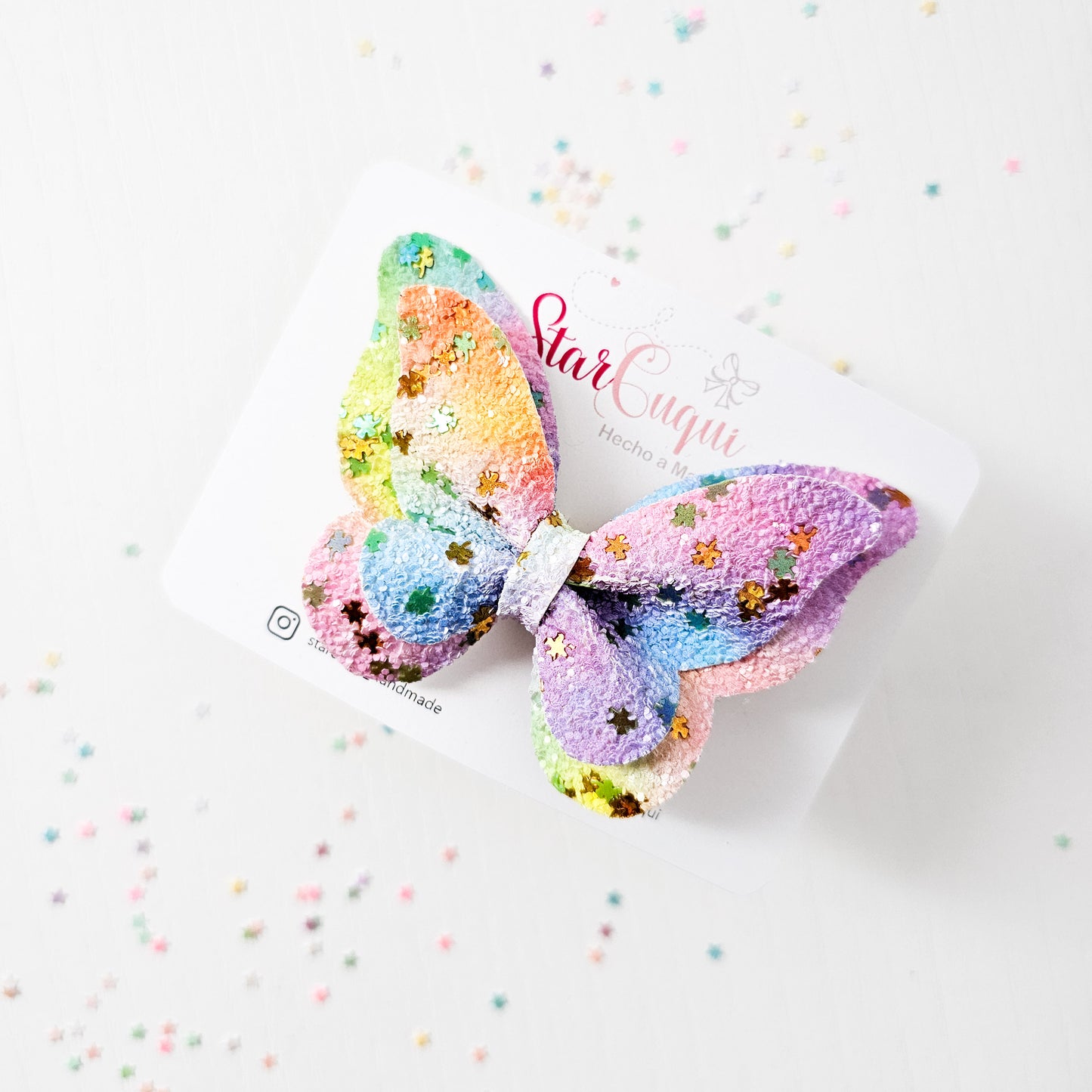 Mariposa brillo multicolor