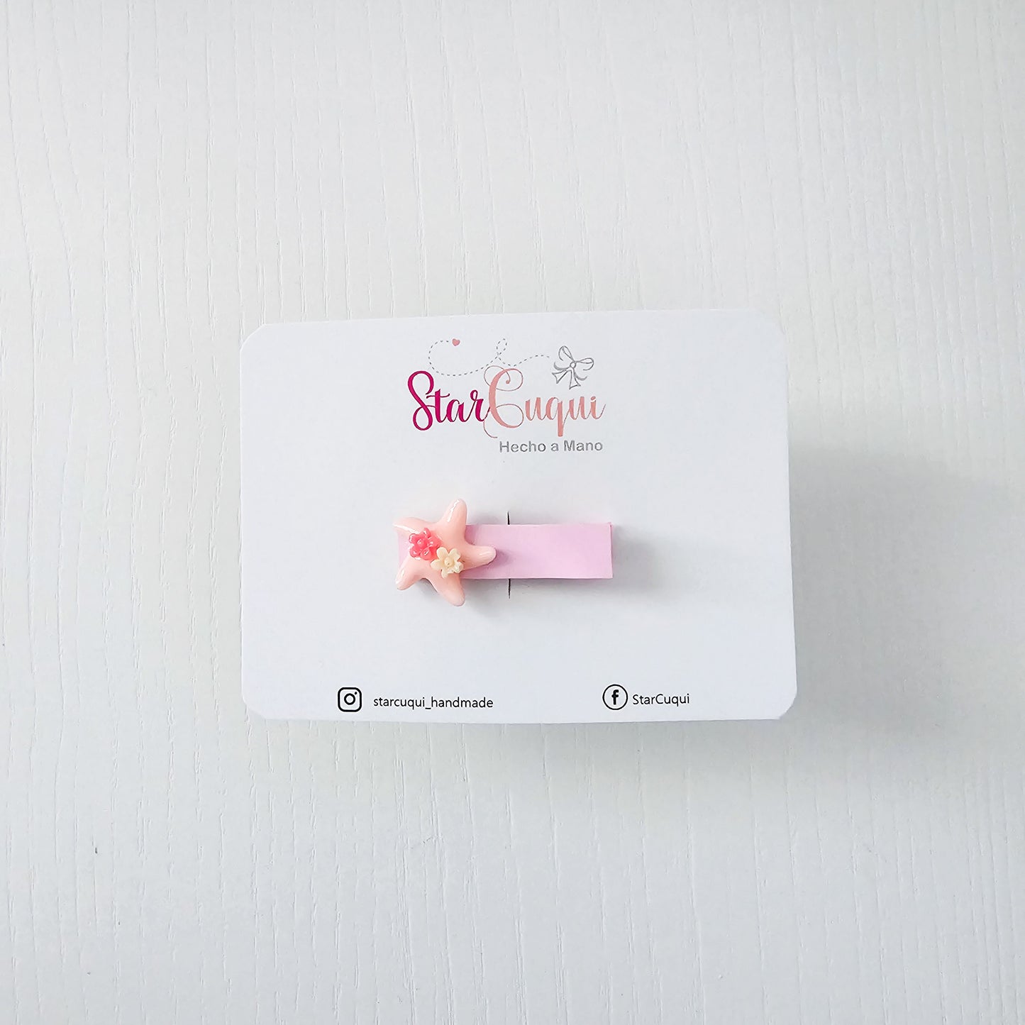 Pinza estrella rosa