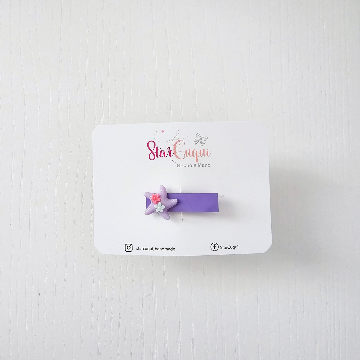 Pinza estrella violeta