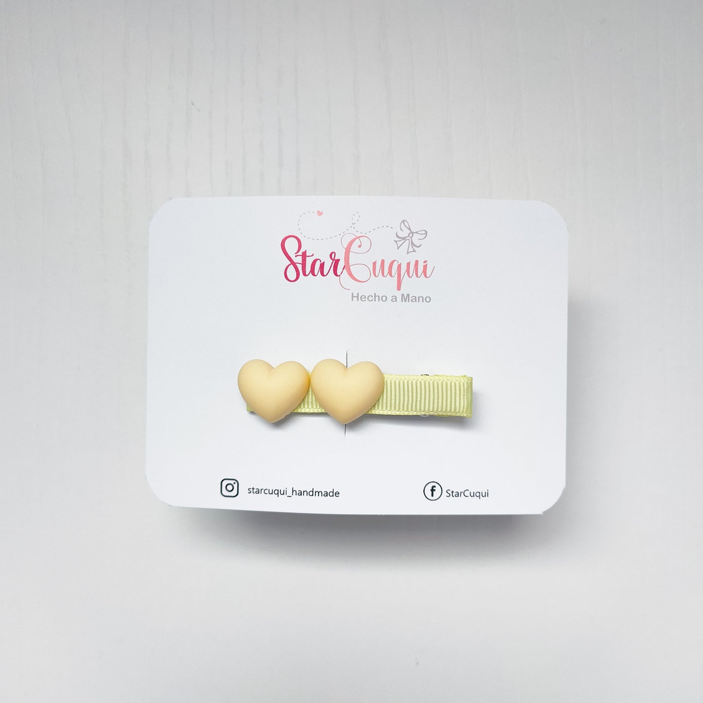 Pinza arcoíris corazón amarillo