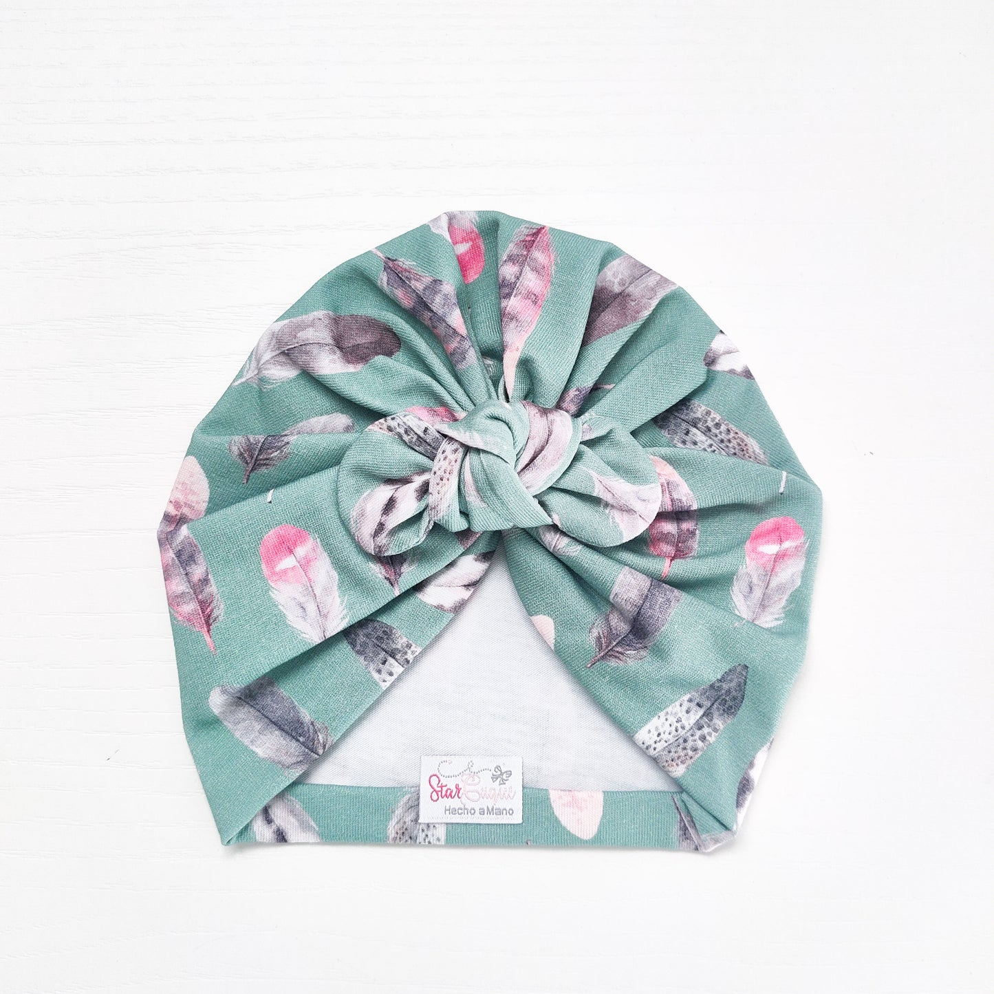 Turbante plumas menta