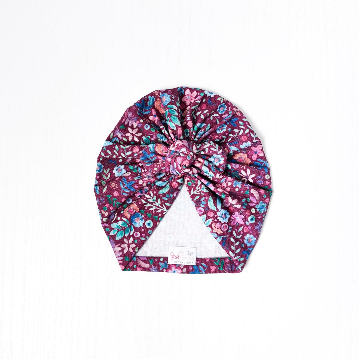 Turbante flores berenjena