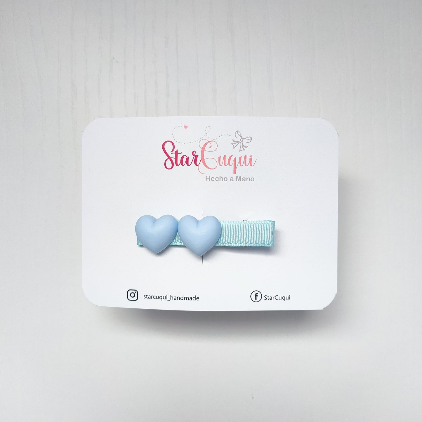 Pinza arcoíris corazón azul