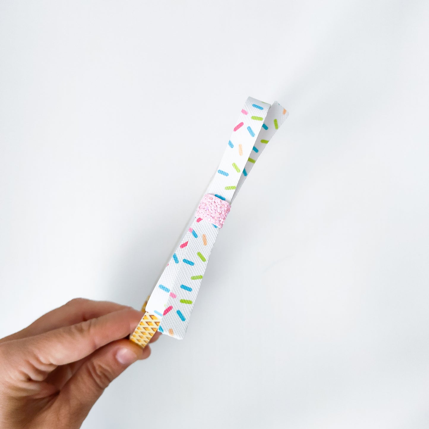 Helado rosa diadema