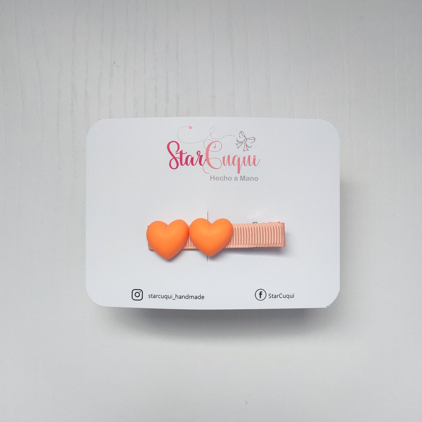 Pinza arcoíris corazón naranja