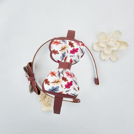 Diadema Caída de hojas rosa