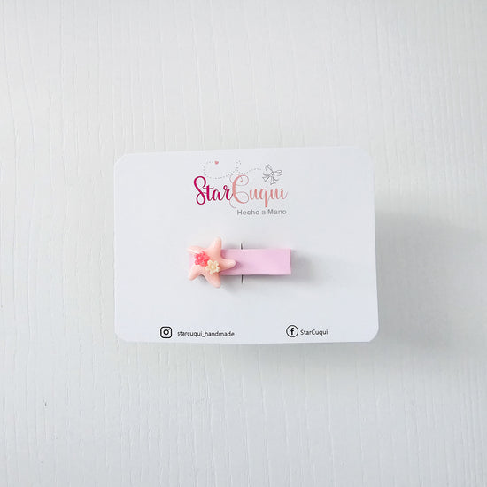 Pinza estrella rosa
