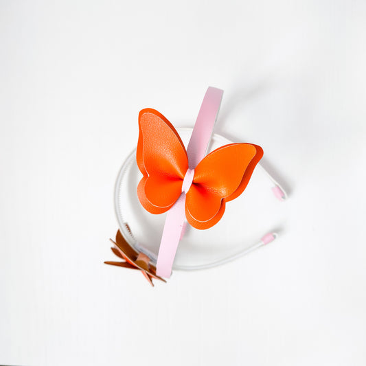 Diadema mariposa naranja/rosa