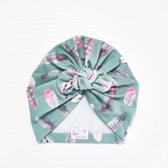 Turbante plumas menta
